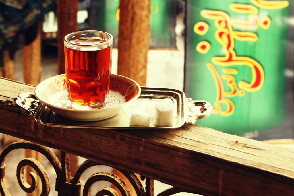A cup of tea sitting on top of a wooden table